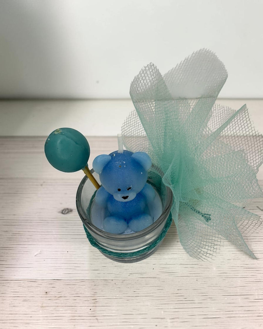 ELAIOPHOS blue teddy bear candle with balloon accent in glass jar, perfect for baby showers and birthdays.