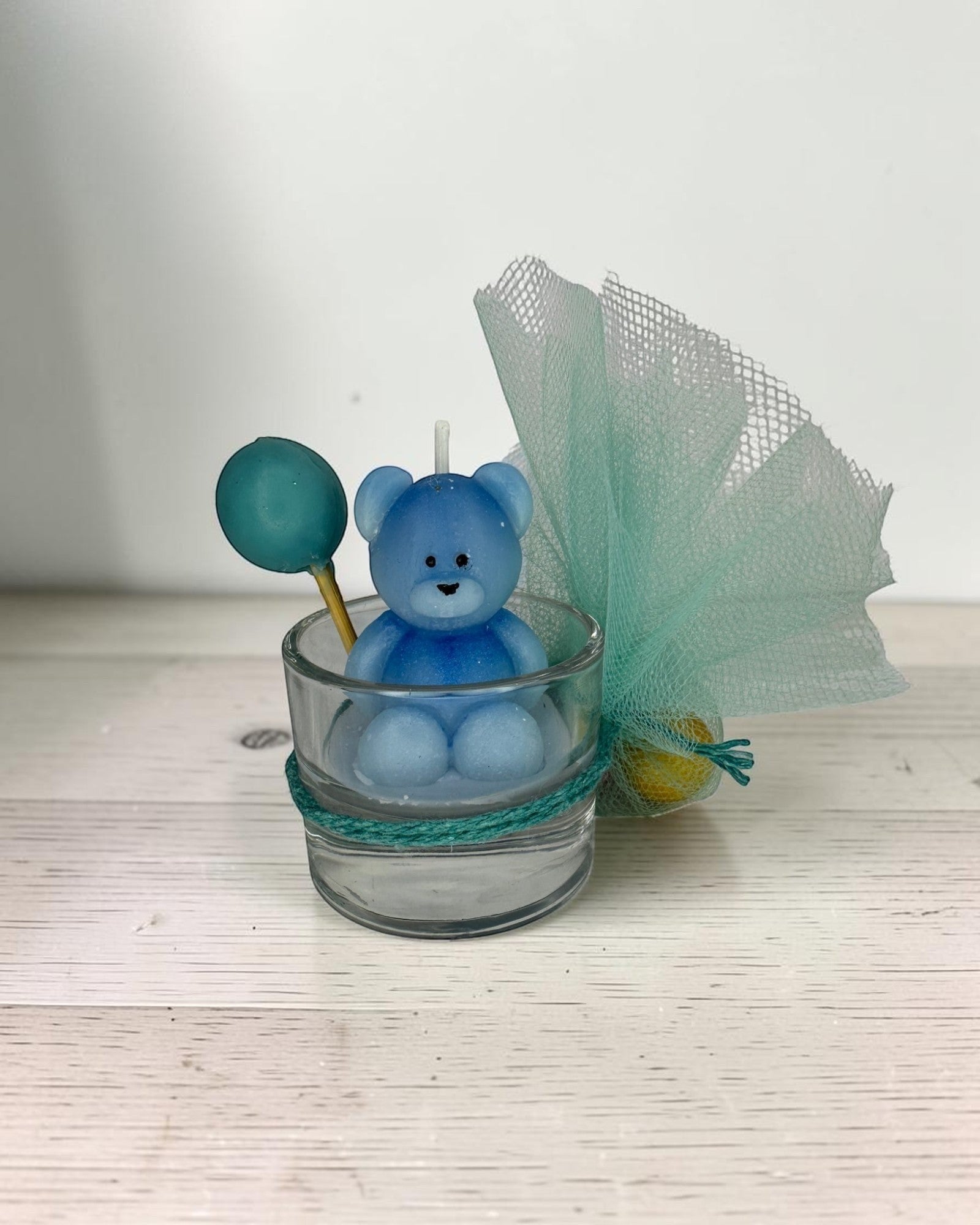 ELAIOPHOS blue teddy bear candle with balloon accent in glass jar, perfect for baby showers and birthdays.